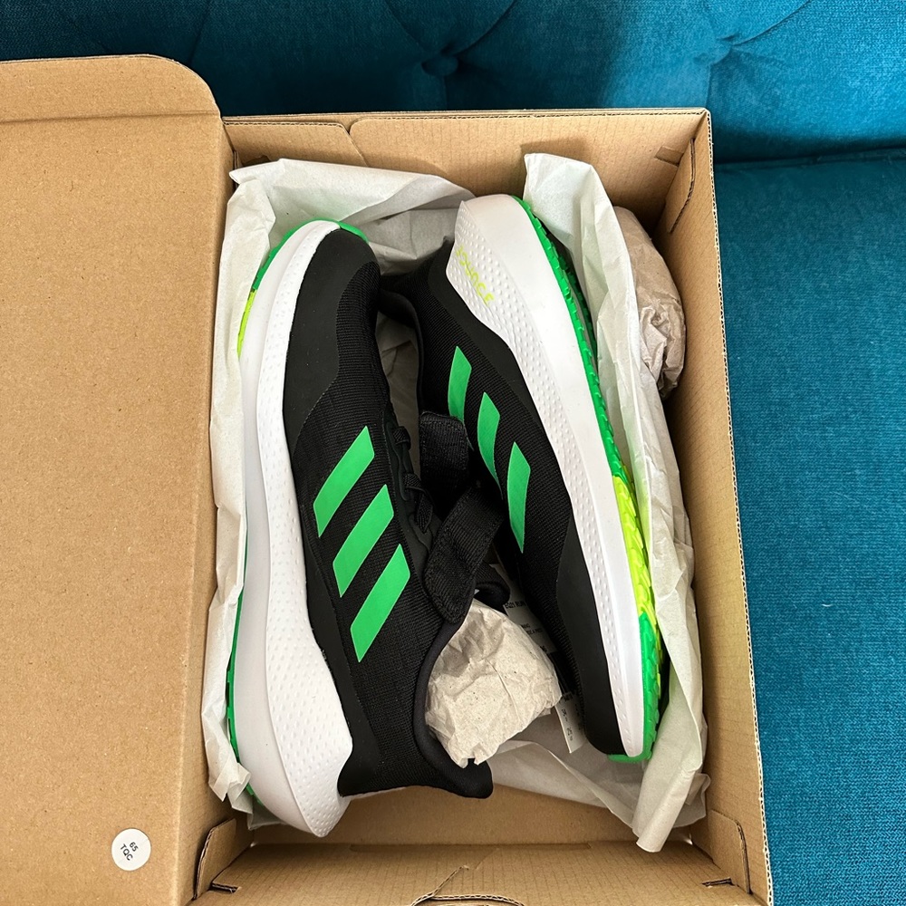 Adidas Youth Size 2 1/2. Black and green Velcro closure.